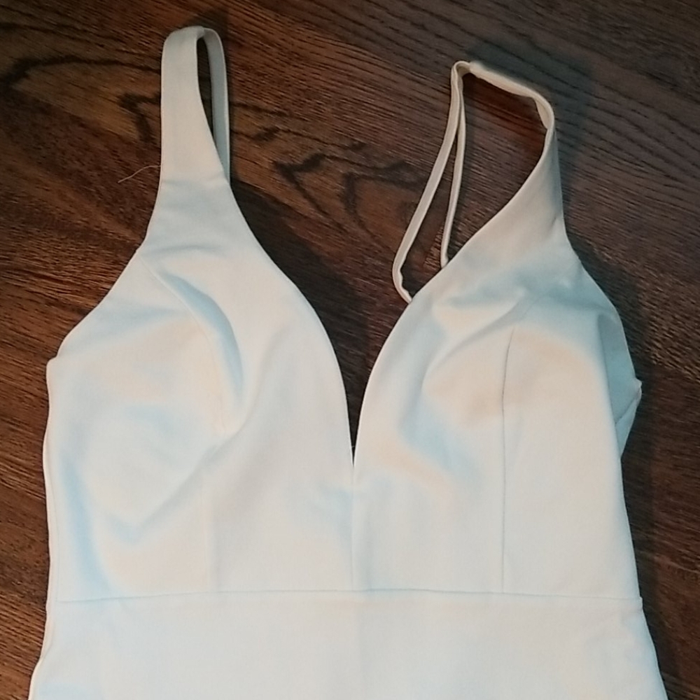 White knee length bodycon dress